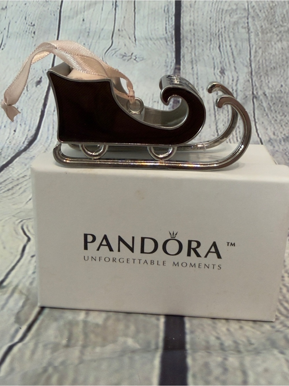 Pandora 2010 Silver Sleigh Charm with Pale Pink Ribbon